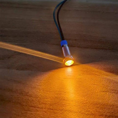Orange LED Indicator Lights 3V To 9V DC Waterproof Panel Mount Signal Lamp Kit 5 Pack emitting light, showcasing anti shock features