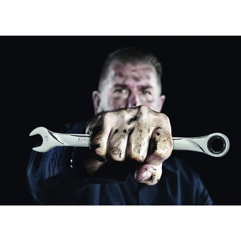 Mechanic holding Three Eighths Inch Ratcheting Wrench With Seventy Two Tooth Box End Minimal Five Degree Swing Off Corner Loading