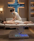 Professional Fully Electric Facial Massage Table With Lift For Estheticians, Dual Control in use during a massage session.