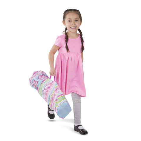 Child carrying Cutie Pie Butterfly Foldable Kids Chair For Lawn And Camping in striped carry bag, easy to transport for playtime.