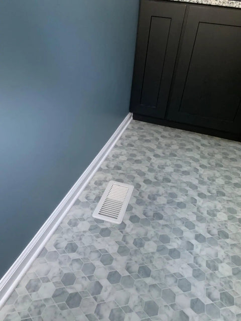 Walk-On Ready Floor Register Vent For 4x10 Openings, Heavy Duty White Finish installed in decorative tile floor near kitchen cabinet