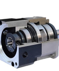 Precision Planetary Helical Gear Reducer Heavy Duty Industrial Speed Reducer Built Like A Tank Smooth As Butter Knockout Torque, cutaway view.