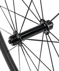 Close-up of Ultra Light 700C Road Bike Carbon Clincher Wheelset hub and spokes for Shimano 8 9 10 11 Speed Cassettes