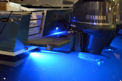 SeaBlaze Mini Underwater LED Boat Lights Pair 700 Lumens Marine Grade Blue illuminating water around boat engine