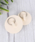 4pcs Rubber Drain Plug with Hanging Ring for Basin and Bathtub, cream-colored round stoppers with metal rings, top view.