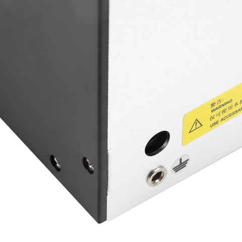 Close-up of Automatic Screw Feeder Screwdriver Machine corner, showing warning label and power connector.