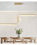 Slick Three Stage Pendant Light With Gold Trim And Matte Black Mounts Crafted From Durable Acrylic Panels For Living Rooms And Bars Featuring Dimmable Warm Led Bulbs That Yield Solid Good Vibes And Zero Fuss Routine in modern dining setup.