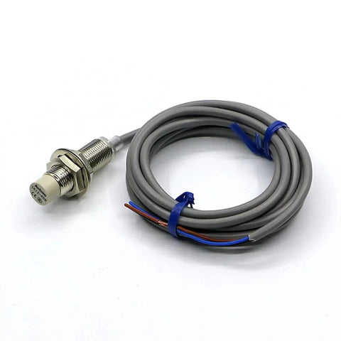 TR12 4AC Normal Close Motion Detection Sensor Switch Inductive Proximity Sensor For Automation And Industrial Control Systems The Workhorse Go To Choice For Door Interlocks And Conveyor Line Monitoring Built To Last. gray metal cylindrical sensor with cable
