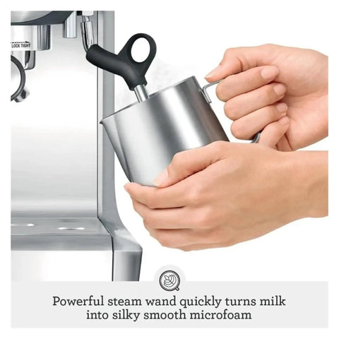Person using steam wand on Smart Home Espresso Maker For Barista Level Espresso At Home With Programmable Brew Custom Strength Quick Heat And Compact Black Sesame Design That Fits Small Kitchens And Tiny Countertops