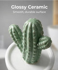 Ceramic Toilet Bolt Covers Decorative Bathroom Hardware Hand Painted Cactus Caps Quirky Garden Theme Water Closet Screw Caps Vibrant Green Succulent Design on a smooth glossy ceramic surface.