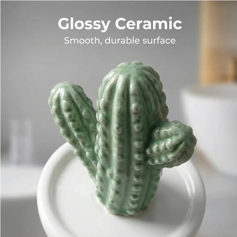 Ceramic Toilet Bolt Covers Decorative Bathroom Hardware Hand Painted Cactus Caps Quirky Garden Theme Water Closet Screw Caps Vibrant Green Succulent Design on a smooth glossy ceramic surface.