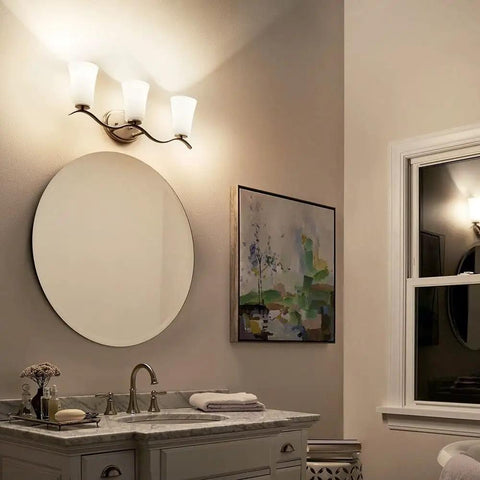 Armida 23 Inch Three Light Vanity Light With Satin Etched White Glass In Olde Bronze above bathroom mirror