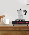 Professional Stainless Steel Coffee Warmer Plate, 80W Electric Mug Heater For Desk And Home on wooden table with white mug.