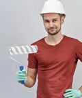 Lightweight Small Paint Roller With Ergonomic Handle For Fast Wall Coverage And Crisp Clean Edges Ideal For Ceilings Trim And Furniture Zero Drip Formula Makes Every Painting Job A Total Breeze held by a man in a hard hat.