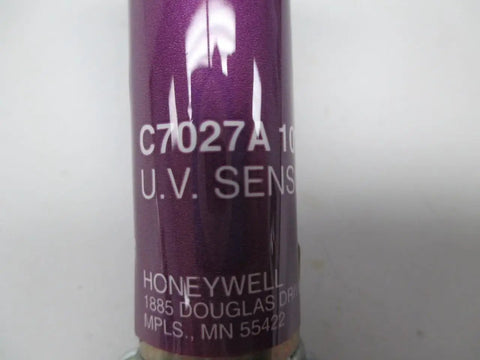 Close-up of a UV Sensor For 1/2 Inch Mounting, showcasing text detailing model and manufacturer information.