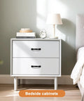 White bedside cabinet with books, clock, and lamp featuring 10 Pack Matte Black Cabinet Pulls With 3 Inch Hole Center 76mm Zinc Alloy Drawer Handles