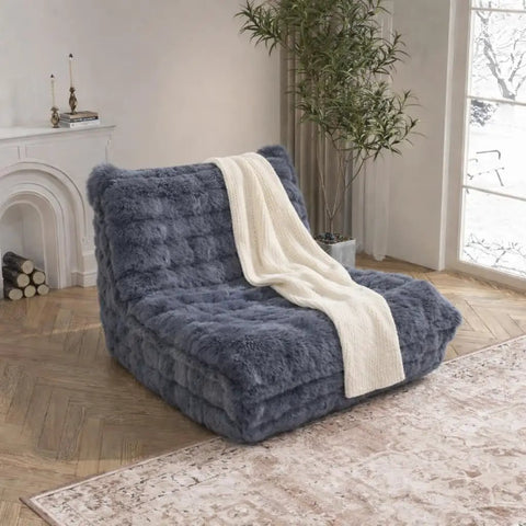 Faux Fur Memory Foam Bean Bag Chair With Filler, Ultra Soft Chill Fireside Lazy Sofa in dark grey in a cozy living room