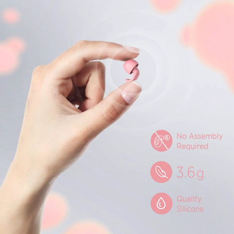 Hand holding pink tip from Ultra Soft Reusable Earplugs For Sleep Flights And Noise Sensitivity 16 Tip Set In XS S M L.