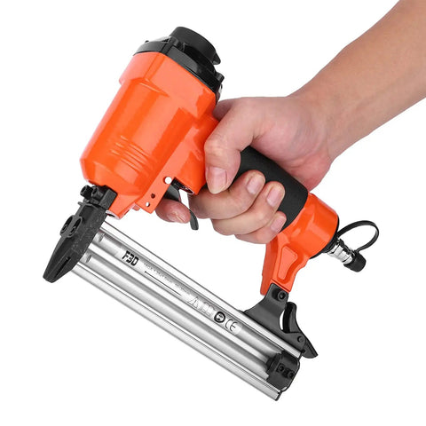 Workhorse Industrial Air Brad Nailer and Pneumatic Straight Nail Gun Built Like a Tank With Solid Cast Steel Body in a person's hand.