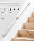 Wall Mounted Stair Handrail With Grippy Abs Cover And Solid Stainless Core For Indoor Outdoor Use Heavy Duty Anti Slip Grab Bar installed on white wall, showcasing hardware and wooden stairs.