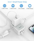 Ultra Slim Flat Plug Power Strip With USB Ports, Five Foot Extension Cord, Three AC Outlets And One USB C shown with charging devices