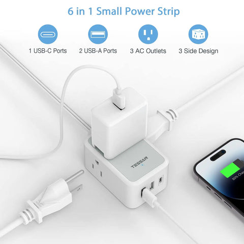 Ultra Slim Flat Plug Power Strip With USB Ports, Five Foot Extension Cord, Three AC Outlets And One USB C shown with charging devices