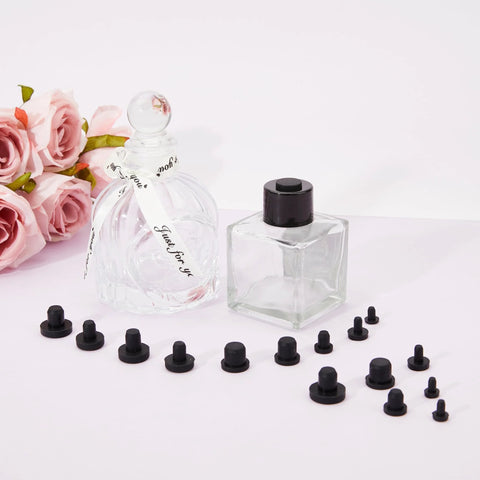 90 Pcs Silicone Rubber Hole Plugs Set With 9 Diameter Sizes next to glass bottles and flowers