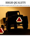 Tough As Nails Slow Moving Vehicle Sign 14x16 Inch Triangle Safety Sign mounted on a vehicle showing high visibility in dim light.