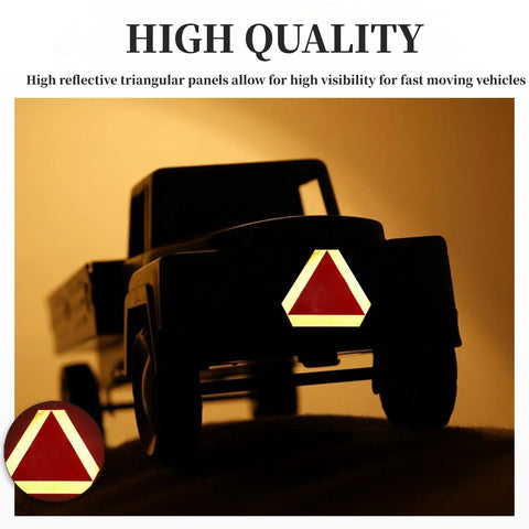 Tough As Nails Slow Moving Vehicle Sign 14x16 Inch Triangle Safety Sign mounted on a vehicle showing high visibility in dim light.
