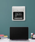 Heavy Duty Time Clock Punch Machine Bundle Includes Fifty Cards For Small Business And Office Password Unlocked Attendance Tracker on a wall.