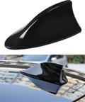 Black Universal Shark Fin Antenna Cover With Adhesive Tape For Cars SUVs And Trucks on vehicle roof, enhancing AM FM signal.