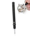 Automatic Watch Oiler Pen for pro grade watch repair with durable pen style and precision tip lubricating a watch gear train.