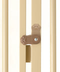 Close-up of the locking mechanism on Tough As Nails Extra Tall Cat Gate Heavy Duty Steel Barrier In Beige for pet safety.