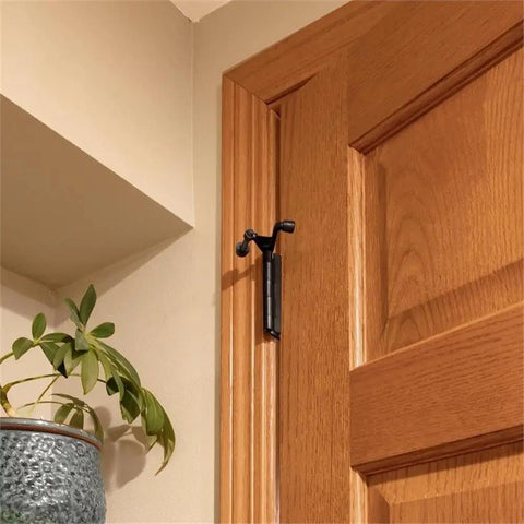 Two Point Two Inch Jumbo Hinge Pin Door Stop With Adjustable 85-125 Degrees, zinc alloy, matte black, installed on wooden door frame