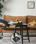 Heavy Duty Square Rubber Caster Cups 2X2 Inch Non Slip Furniture Stopper Glides under sofa legs in living room.