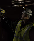 Man using Waypoint Beefy 500 Lumen Handheld LED Spotlight For Outdoor Marine And Emergency Use in dark environment
