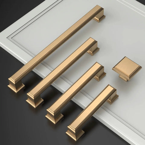 20 Pack 5 Inch Cabinet Handles Champagne Bronze Brushed Brass Gold Hardware For Cupboard And Drawer Pulls Rust Proof Anti Corrosion Easy Install Kitchen Cabinet Hardware For Modern Home Renovations laid out on white surface