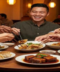 Group of friends enjoying dinner around a 24 Inch Round Wooden Lazy Susan Turntable For Kitchen Cabinet Storage And Spicy Condiments in a restaurant.