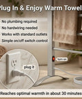 Plug-in setup of Six Bar Electric Heated Towel Rack for Bathroom with Wall Mount or Freestanding Design, outlet and power cord visible.