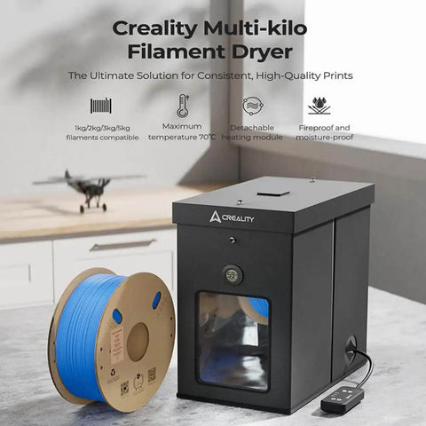 Multi-Kilo Filament Dryer For 1kg To 5kg Spools, Heats Up To 70 Celsius, black unit with blue PLA spool on table