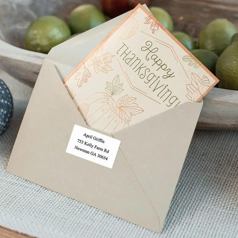 Heavy Duty Thermal Sticker Label Paper For M120 M110 M220 M250 M150 Label Makers on a greeting card envelope.
