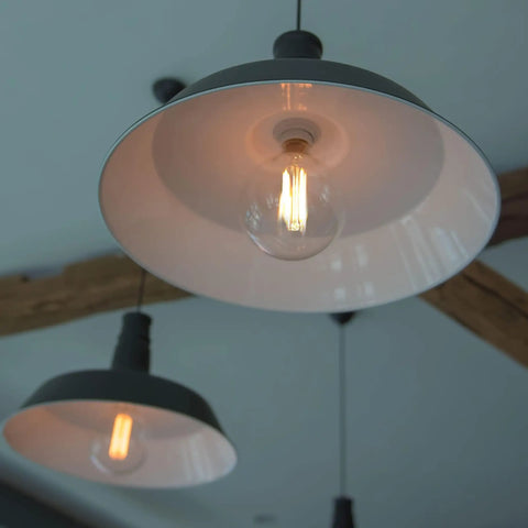 G25 LED Filament Vanity Bulb 40W Equivalent, 500 Lumens, 2700K Warm White, E26 Edison Base in a pendant light