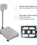 Heavy Hitter Digital Floor Scale With Six Hundred Sixty One Pound Capacity And Spit Spot One Gram Precision For Warehouse Shipping Or Animal Weighing Featuring Glowing Lcd Monitor And Slick Unit Switching Setup with stainless steel tray and durable base.