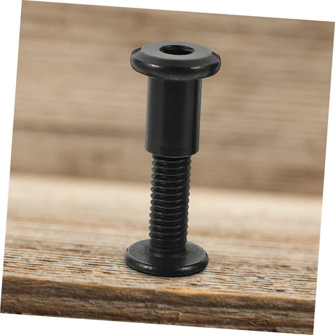 Top Shelf Five Piece Pack Of Black Stainless Steel Binding Screws And Nuts For Scrapbooks Photo Albums And Bookbinding With Countersunk Flat Head For No Sweat Setup, single screw on wooden surface.