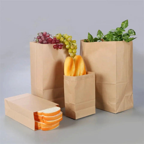 Kraft Paper Bags Khaki Party Favor Bags Set Of 50 Or 100 Pcs In 28x28x14 Cm Eco Friendly Gift Bags filled with bread, fruit, and plants
