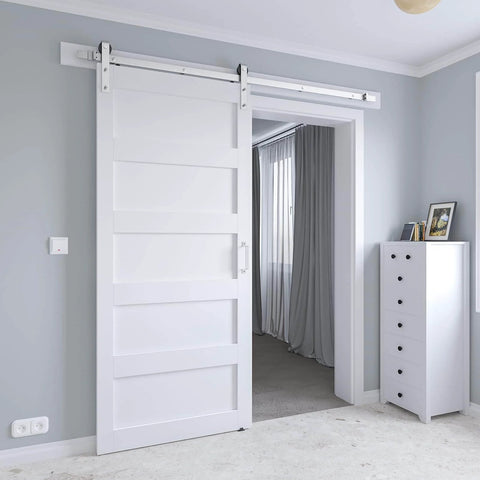 36 By 84 Inch White Sliding Barn Door With 6.6 Foot Brushed Nickel Hardware Kit And Handle, installed in modern interior