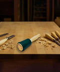 20-Ounce Urethane Mallet For Woodworking, Quiet Yet Powerful Hammer With Maximum Blow Transmission, on a wooden table with chisels