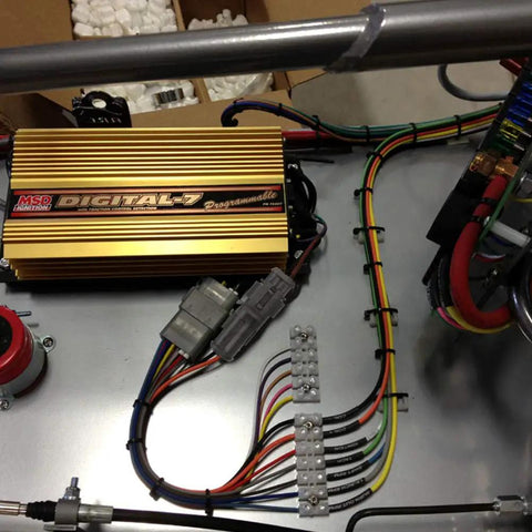 2 Pin Waterproof 18AWG Wire Connector Kit installed with wiring and terminals linked to a Digital-7 ignition system on a vehicle.