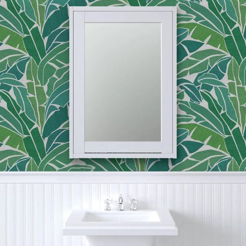 Top Shelf Tropical Leaf Wallpaper Exotic Plant Design Type II durable matte linen texture in bathroom with mirror.