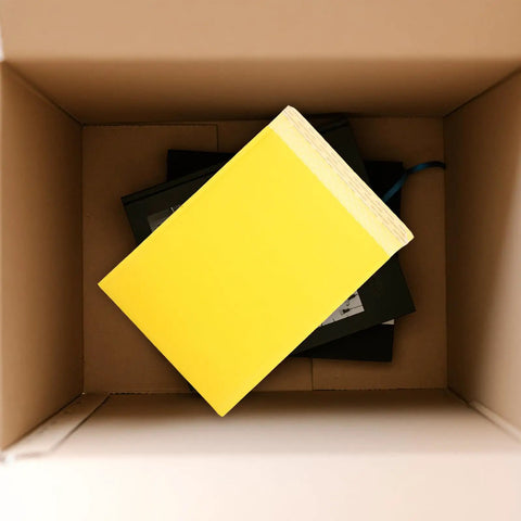 Waterproof Bubble Mailers 25 Pack 28x37 cm Plus 6 cm Thick Self Adhesive Padded Envelopes in a cardboard box.